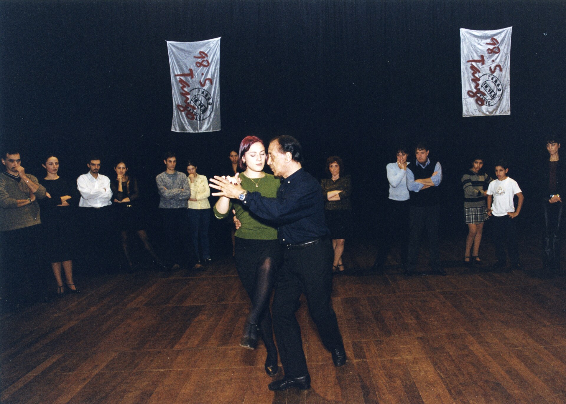 Juan Carlos Copes teaching Argentine tango while students observe