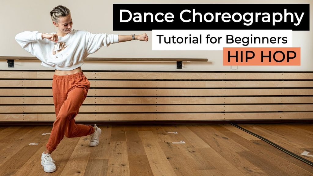Dancer demonstrating choreography in a studio